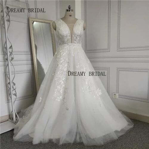 Dreamy Bridal Plunging V Neck Wedding Dresses Floral Appliques Pleated Chest Chapel Train Bridal Gowns