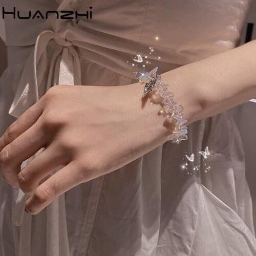 HUANZHI 2020 New Fairy Sweet Butterfly Pendant Irregular Transparent Crystal Elastic Rope Bracelet for Women Party Jewelry