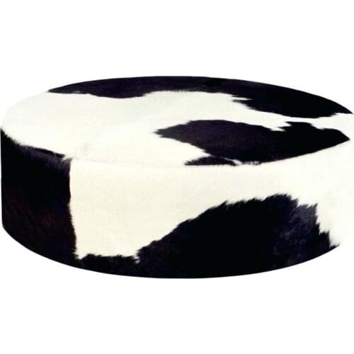 Creative use of round cowhide stools for durability