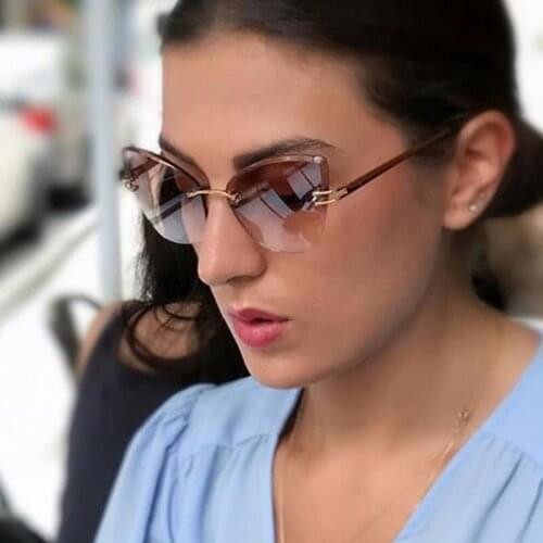 Elegant Stylish Women Sunglasses Cat Eye Rimless Sunglass Fashion Designer Female Cateye Sun Glasses UV400 DE0623