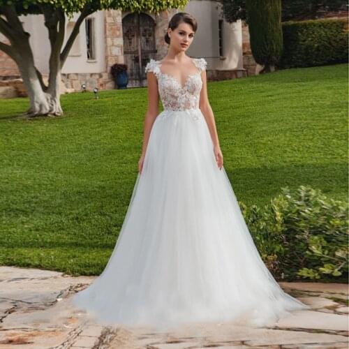 Sweetheart Cap Sleeves A Line Tulle Wedding Dress Lace Appliques Bridal Gown Backless Vestido De Noiva with Train Free Shipping