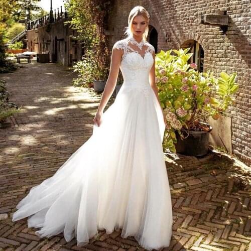Turkey Wedding Dresses Lace Cap Sleeve Wedding Gowns A Line Vintage Boho Bridal Dress 2021 Brautkleid Illusion Back Applique