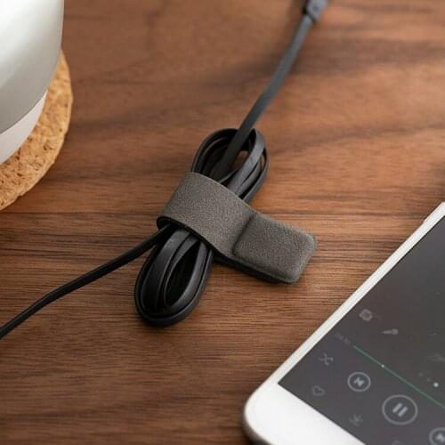 China hot sales household USB data Cable cord organizer desks leather earphone wires storage box magnetic connection