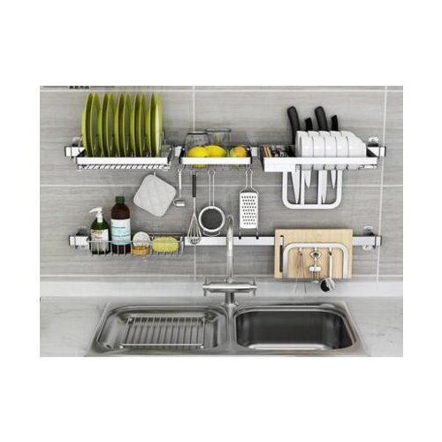 Stainless steel kitchen utensil. Place bowl. Sink rack