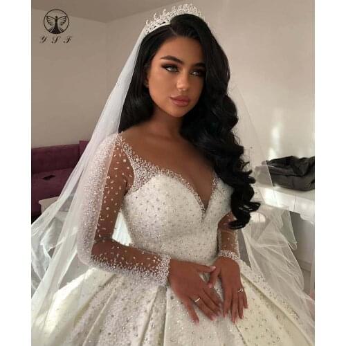 2020 Luxury Wedding Dresses Deep V Neck Beaded Bling Bling Long Sleeve Satin Floor Length Puffy Bridal Gown