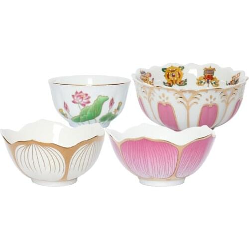 A ceramic lotus bowl is dedicated to the altar and a small bowl of water is dedicated to the eight auspicious things in the temp