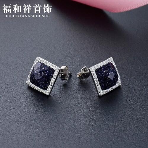 Korean version of small fragrance style personality ear ornaments s925 pure silver cold wind star ear nail womens weekly small