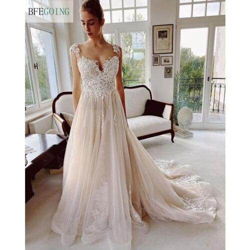 Ivory Lace Champagne Beading Tulle Sleeveless Bridal Gowns Floor-Length A-Line Wedding Dresses Chapel Train Custom Made
