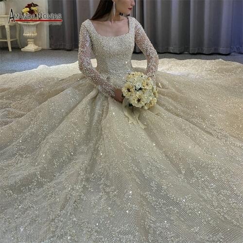 Long sleeves lace wedding dress 2021 with pearls back lace up