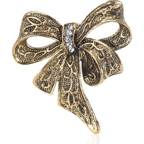 Sales fashion alloy electroplating retro bowknot diamond brooch corsage, high-end womens clothing accessories