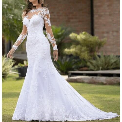 Long-sleeved wedding dress 2021 new bridal lace slim round neck covering arm temperament forest light tail wedding dress