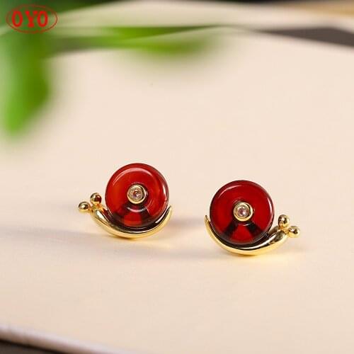 S925 silver jewelry blood amber snail earrings