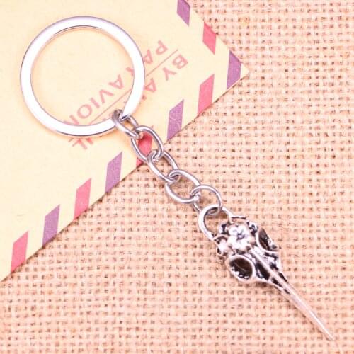 20pcs New Fashion Keychain 41x12mm skeleton bird dagger Pendants DIY Men Jewelry Car Key Chain Ring Holder Souvenir For Gift