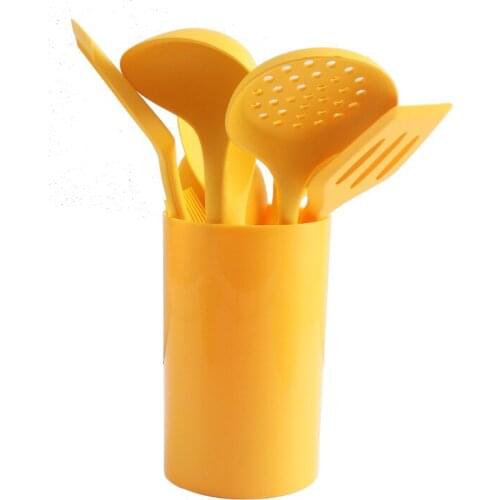 All-inclusive silicone kitchenware 8-piece set Bright yellow cooking shovel spoon set Wind integrated kitchen tool spatula