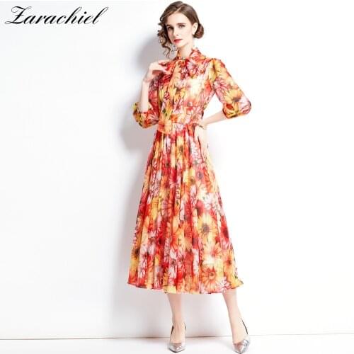 Menahem Autumn Bohemian Sunflower Dress Women Lantern Sleeve Bow Collar Orange Floral Print Chiffon Pleated Long Beach Robe Femm