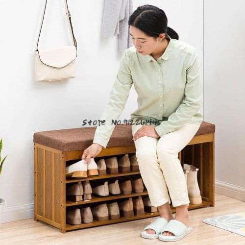 Simple shoe changing cabinet household door can put shoes and sit dual-purpose shoe changing rack solid wood integrated storage