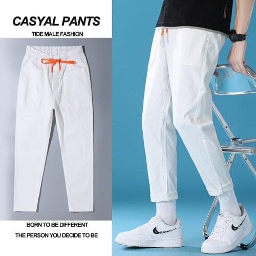 2021 brand new young mens pure color loose casual pants stretch sports pants fashion trend Harlan calf denim cropped trousers