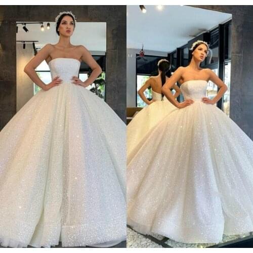 2020 Gorgeous Arabic Wedding Dresses Bling Bling Sequins Strapless Plus Size Ball Gown Wedding Dress Sparkly Princess Bridal Gow