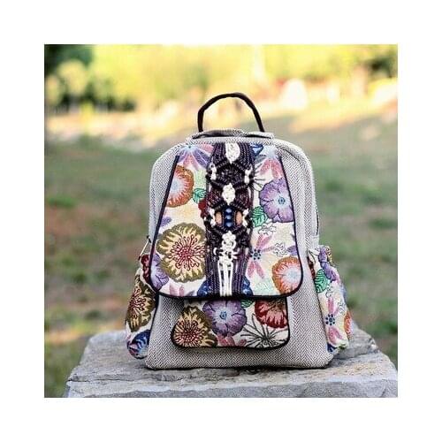 Fashion national String appliques women traveller backpacks!Nice floral embossing lady cover backrack All-match canvas backruck
