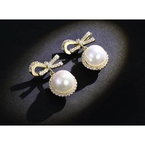 2021 Wholesale Korean Fashion New Bow Earrings Temperament Pearl Earrings Wild Simple Female Earrings Jewelry