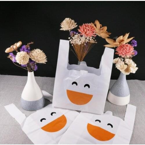 20x32cm 100pcs Cheap Smile face supermarket shopping bag vest bag plastic bags with handle snack boutique clothing bag