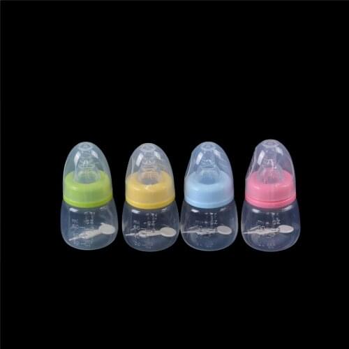 60ML Random Color Newborn Baby Nursing Milk Fruit Juice Water Feeding Standard Mouth Silicone Nipple Pacifier Drink Bottle