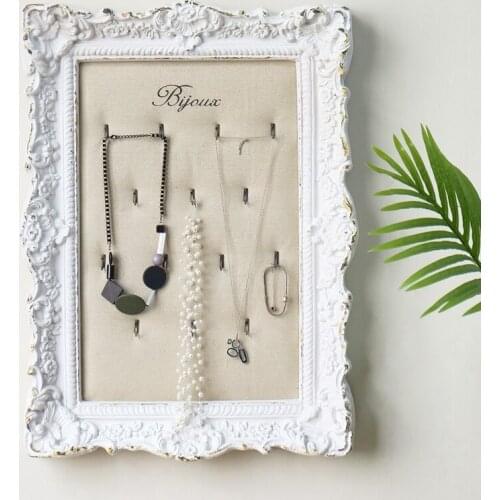 Wall retro white photo framed necklace display