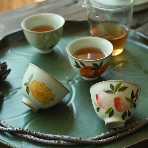 Quaint Porcelain Hand Painted in-Glaze Decoration Stoneware Fresh Tea Master Cup Buddha Hand Pomegranate Kung Fu Tea Cup