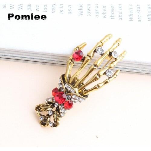 Pomlee 2021 New Arrival Skull Hand Brooch Unisex Punk Pin Antil Gold Red Rhinestone Brooch Gift Clip Accessories Whosales