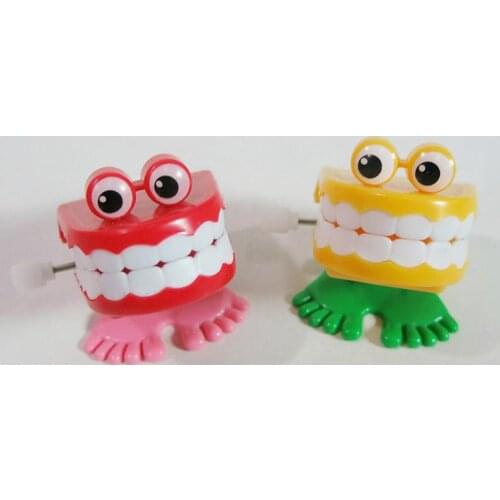 1pcs Clockwork Toy Upper Chain Jumping Tooth Toy Children Jump Teeth Running Clockwork Spring Wind Up Toy