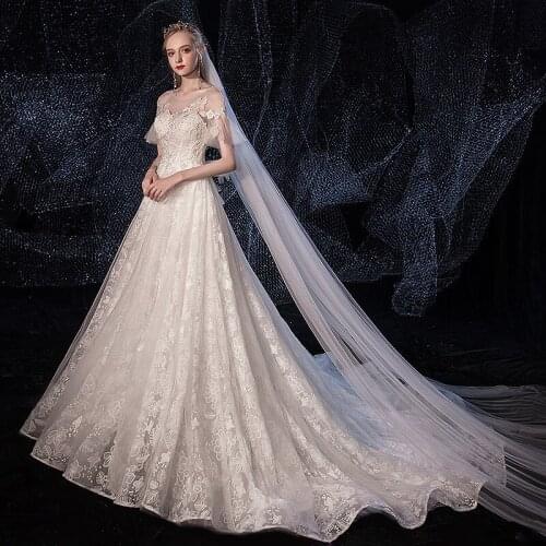 Luxury Wedding Dresses A-Line Shiny Appliques Beaded Lace Light Champagne Plus Size Train Princess Bridal Gowns For Wedding New