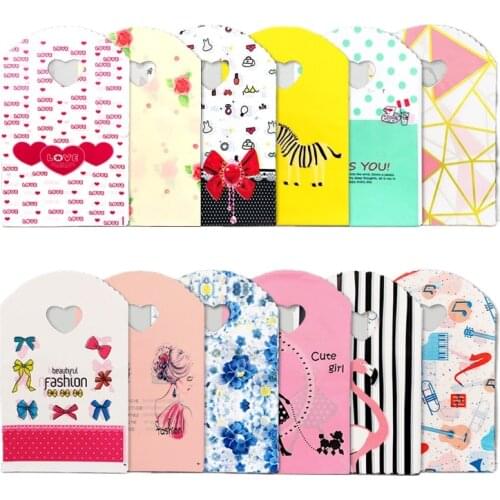 50pcs/lot Various Patterns Jewelry Plastic Bag Heart-Shaped Oval Handles Mini Gift Packing Bag Store Small Shopping Bags
