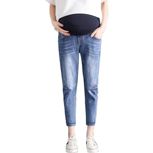 Spring and summer pregnant women jeans new Korean version of the stomach lift straight nine pants loose slimming harem pants