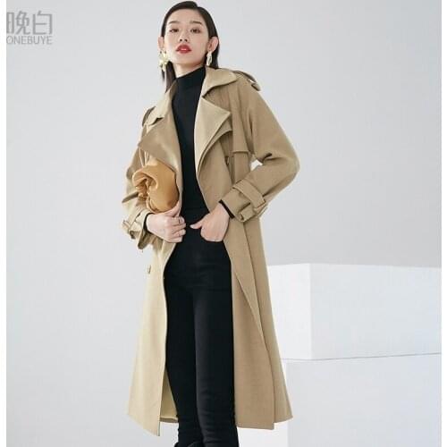 Shopping malls with the same late white 2021 winter new fashion Lapel long sleeve waist belt long windbreaker coat