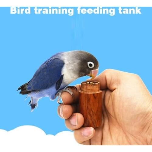1pcs Portable Bird Food Feeder Rosewood Bird Training Food Jar Parrot Intelligence Growth Feeding Training Tools Tabletop Toys