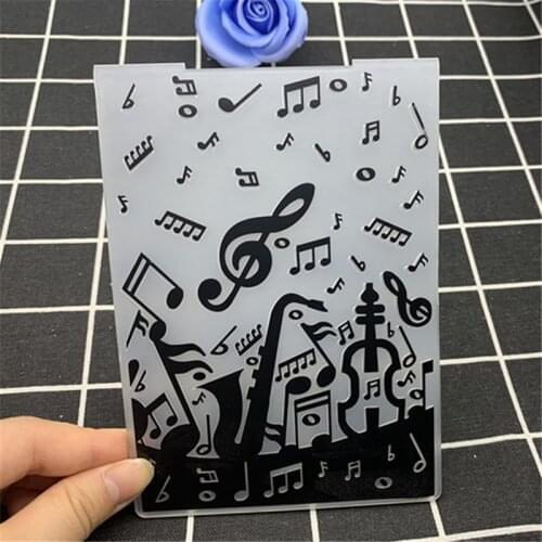 Music world musical instruments playing notes transparent folding embossing board DIY handmade works background embossing mold