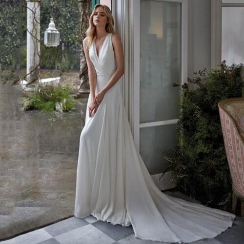 Eightree Simple Wedding Dresses Sexy 2021 White Boho Beach Wedding Gown V-neck Backless Sleeveless Bridal Gowns Long Custom Made