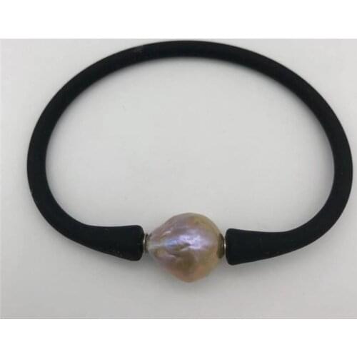 Natural purple freshwater pearl with Nucleated Baroque size About 13X15MM Rubber bracelet 7.5"