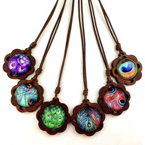 Jaingzimei 24pcs Beautiful Peacock Feather glass Cabochon with Wood and Silver zinc alloy Base Women Necklace for Party