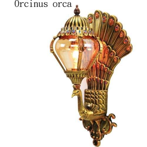 Creative luxurious peacock waterproof wall lamp courtyard living room corridor personality retro gold LED outdoor wall lamp