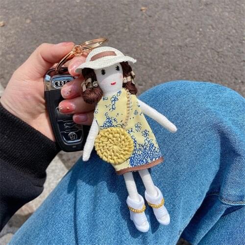 Korean fashion floral skirt young lady keychain cute net red doll doll gift bag pendant keychain