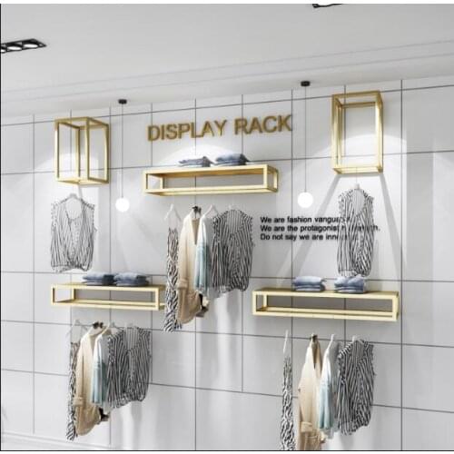 Golden clothing store display rack wall creative womens clothing store shelf wall hangers shelving shelves shelving racks