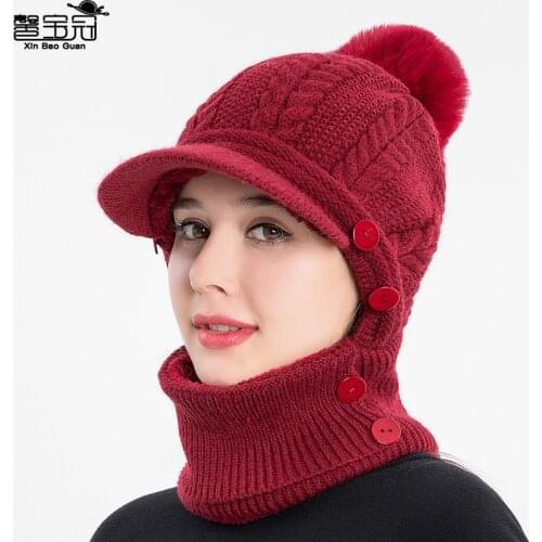 Winter womens knitted pullover ear protection hat European and American wool hat womens bib integrated warm hat