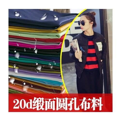 440T waterproof nylon fabric 20D satin round hole anti-down down jacket windbreaker cloth 1m