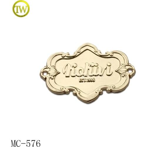 MC576 High quality gold color 2 holes sewing metal clothing label custom logo metal tag
