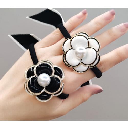 Fashion luxury camellia pearl hair ring temperament female student rose hair rope elastic gift