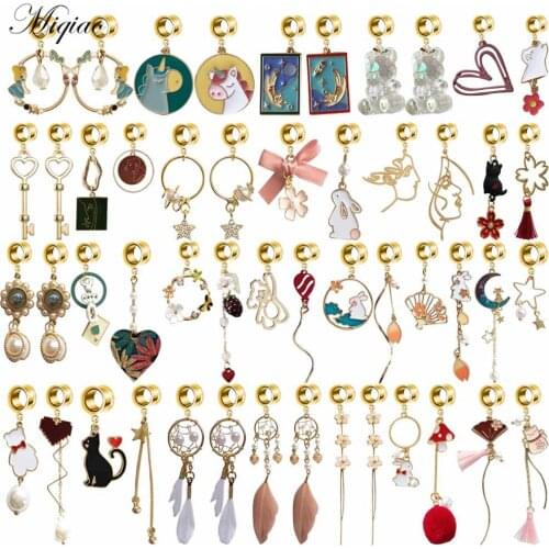 Miqiao 2pcs Aesthetic Fantasy Hollow Starry Sky Moon Cat Unicorn Bow Pendant Ear Amplifying Human Body Piercing Jewelry