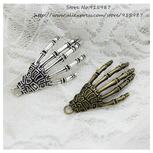 Sweet Bell 20pcs/lot 22*43mm Two Color Antique Metal Alloy Skull Hand Charms Jewelry Making Pendant Jewelry Findings D0635