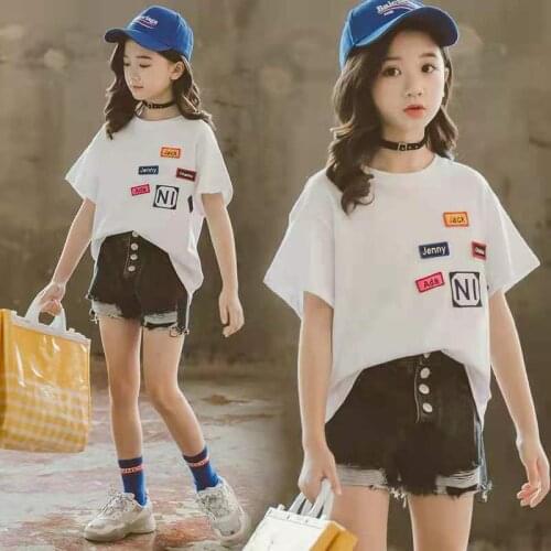 Childrens clothing spring And Summer New Girl Baby Pants Medium And Large Childrens Temperament hole tassel denim shorts tide