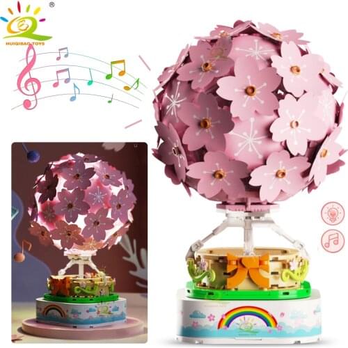 HUIQIBAO 718Pcs Cherry Blossoms Hot Air Balloon Music Box Rotating Building Blocks Sakura With Light Bricks Toys for Children
